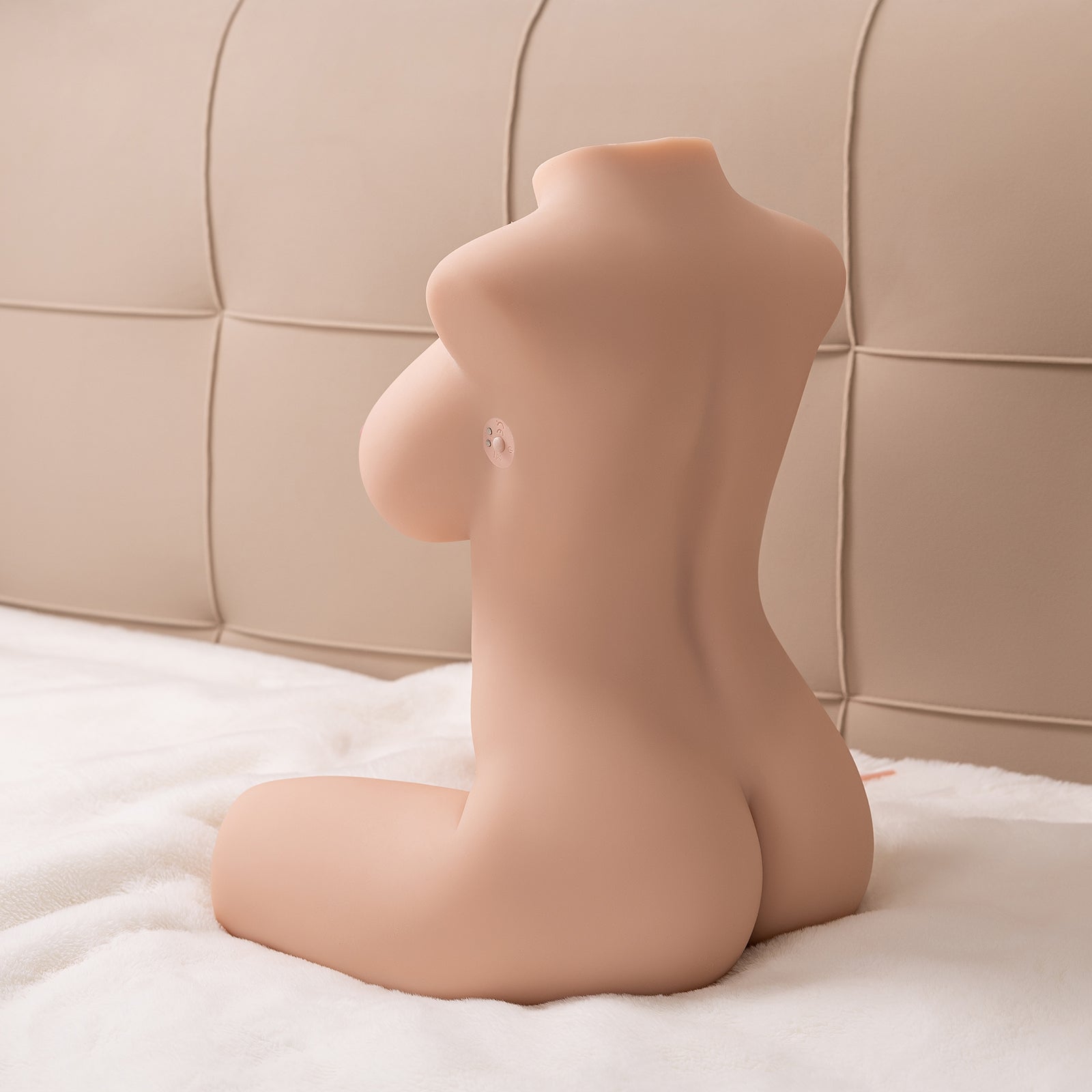 Female torso sex doll back profile highlighting waist-to-hip transition